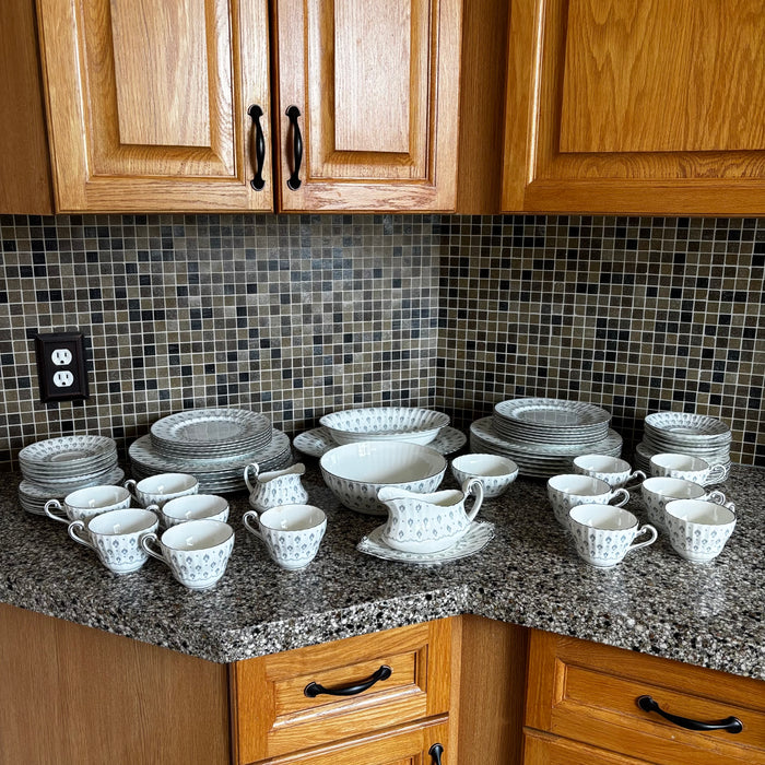 69 Piece Paragon Regency Print China (one teacup is chipped) - Z145