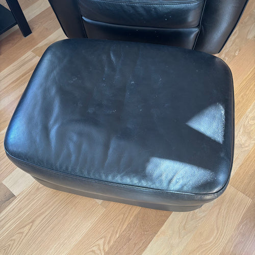 D100 Natuzzi Editions black leather arm chair and ottoman