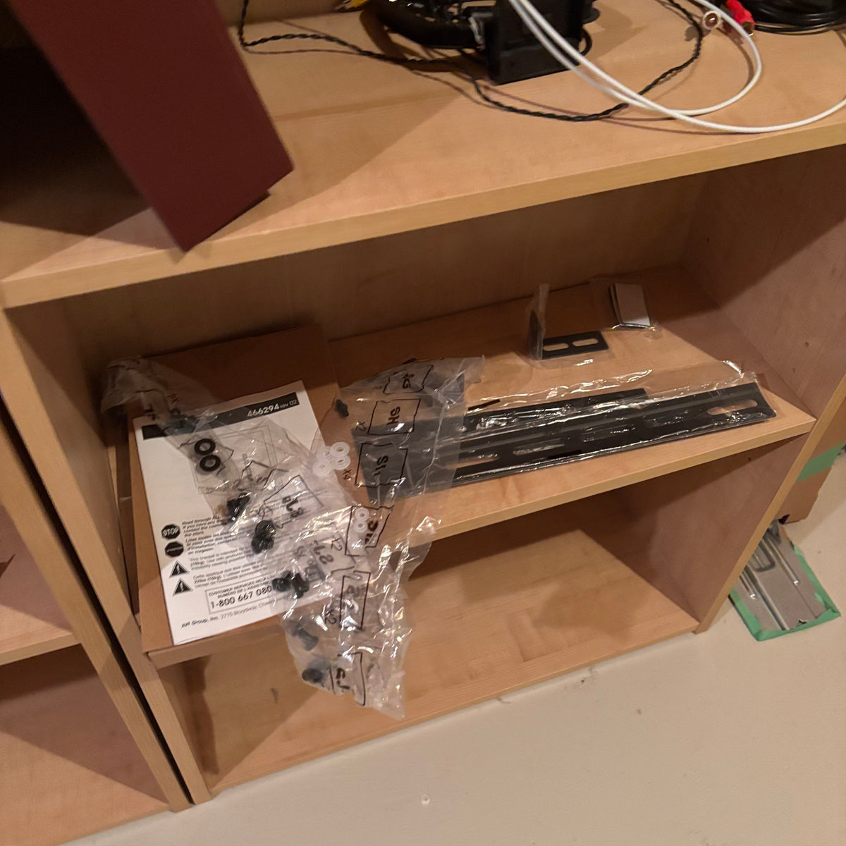 X228 2 Simple storage shelves with contents