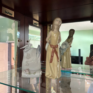 W833 Lladro grouping (Naughty girl with straw hat and scroll)